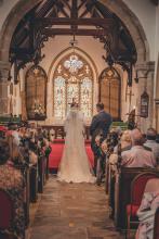 Wedding couple at the altar