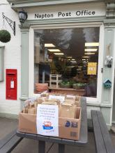 Messy Church Bags outside Napton Stores awaiting collection